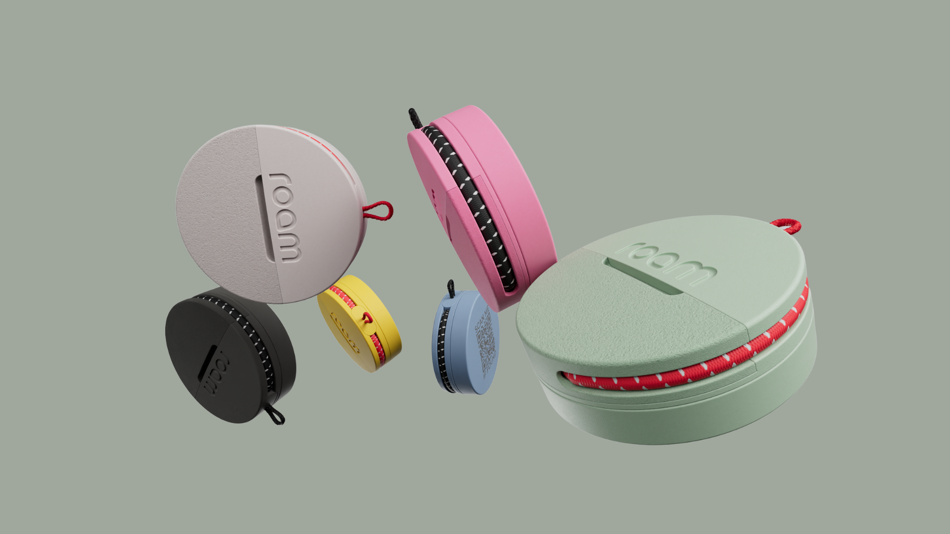 Five Roam Smart Trackers in white pink black yellow and mint green colors scattered on a grey background showcasing the smallest Bluetooth tracking device