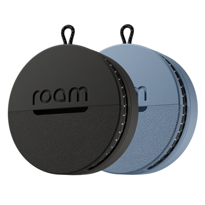 2-pack Roam smart trackers in multi-colour black and blue showing compact round design with Roam branding on transparent background