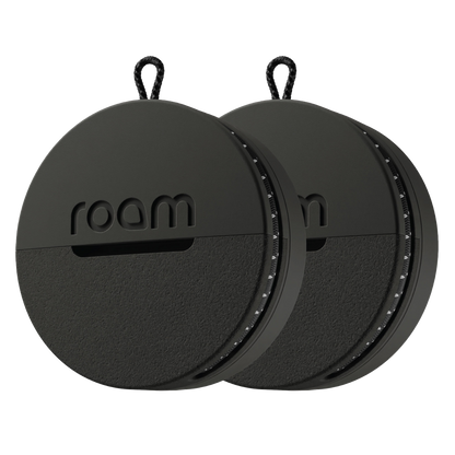 Two black circular devices with 'roam' branding on a white background