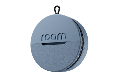 Round blue device with 'roam' branding on a white background